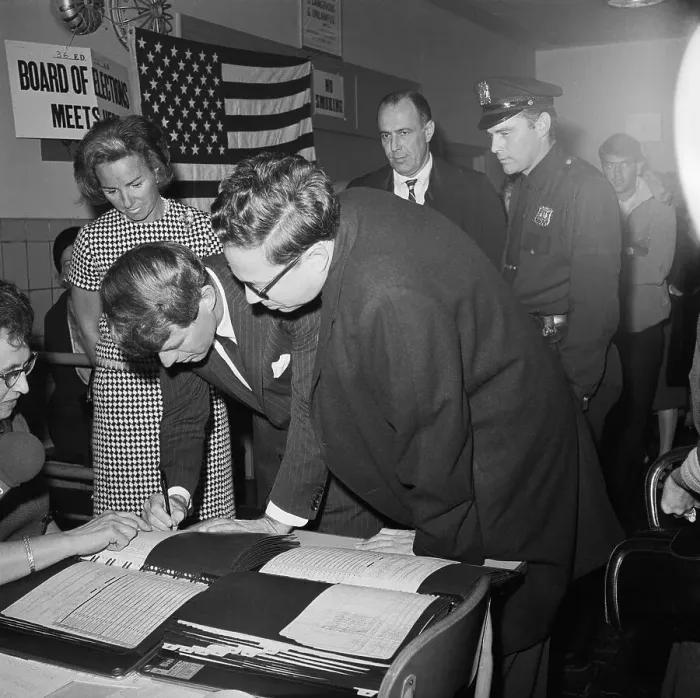 Framed Print : Robert Kennedy Signing a Voting Register Framed Print : Robert Kennedy Signing a Voting Register