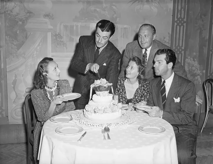 Framed Print : Robert Taylor with Others at Birthday Party Framed Print : Robert Taylor with Others at Birthday Party