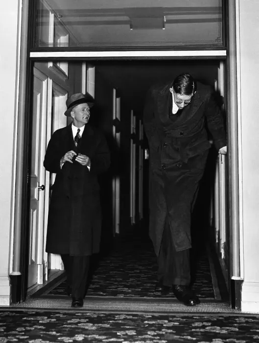 Framed Print : Robert Wadlow Leaving Hotel with Father Framed Print : Robert Wadlow Leaving Hotel with Father
