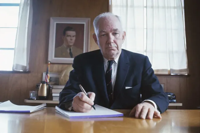 Framed Print : Robert Welch Sitting at a Desk Framed Print : Robert Welch Sitting at a Desk