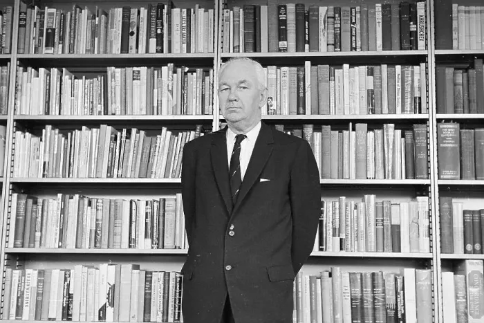 Framed Print : Robert Welch Standing by Bookshelf Framed Print : Robert Welch Standing by Bookshelf