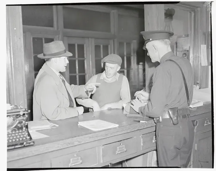Framed Print : Robert Wilson Standing at Police Desk Framed Print : Robert Wilson Standing at Police Desk