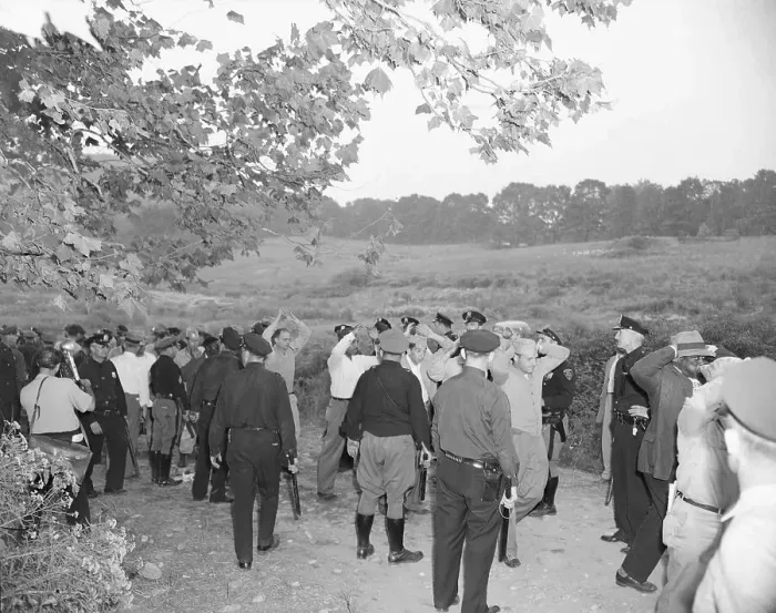 Framed Print : Robeson Supporters Walking in Submission to Police Framed Print : Robeson Supporters Walking in Submission to Police