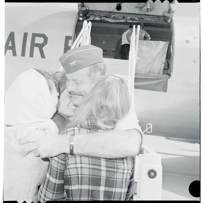 Framed Print : Robin Olds Embracing His Family Framed Print : Robin Olds Embracing His Family