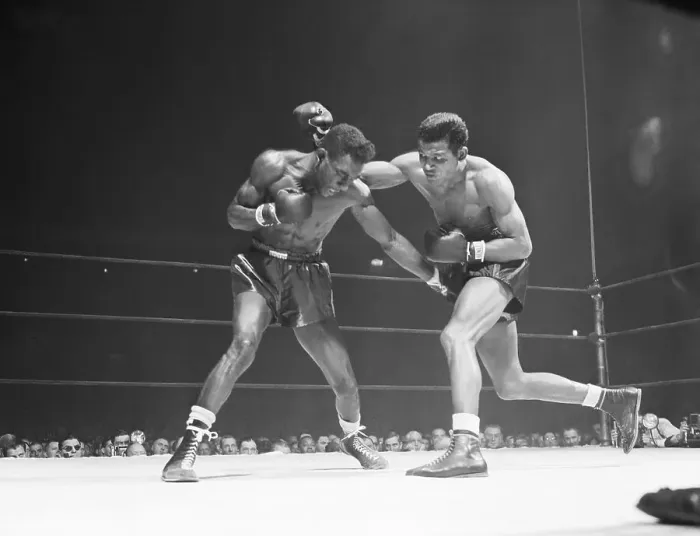 Framed Print : Robinson Throws Punch in Title Match Framed Print : Robinson Throws Punch in Title Match