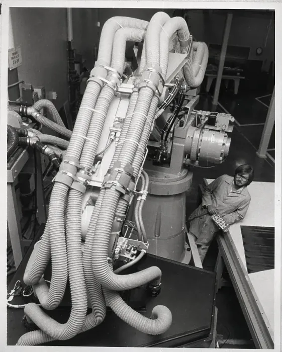 Framed Print : Robot Suction Hoses And Operator Framed Print : Robot Suction Hoses And Operator