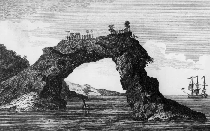 Framed Print : Rock Arch. An arched rock topped with a fenced compound on the coast of New Zealand Framed Print : Rock Arch. An arched rock topped with a fenced compound on the coast of New Zealand