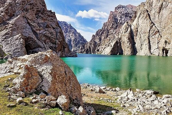Rock formation around the alpine Koel-Suu lake, Kurumduk valley, Naryn province, Kyrgyzstan
