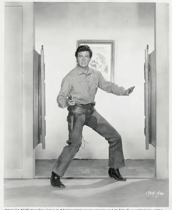 Framed Print : Rock Hudson Holding a Gun Framed Print : Rock Hudson Holding a Gun