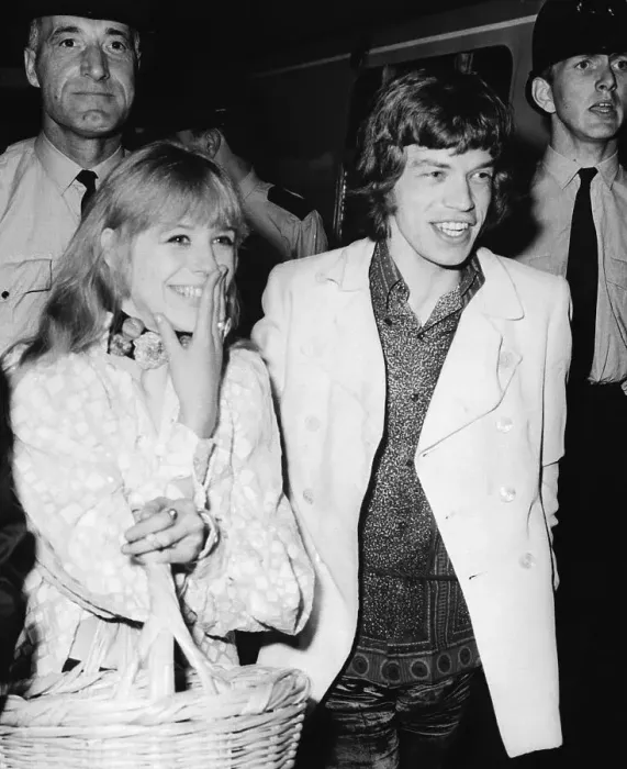 Framed Print : Rock Musician Mick Jagger and Girlfriend Boarding Train Framed Print : Rock Musician Mick Jagger and Girlfriend Boarding Train