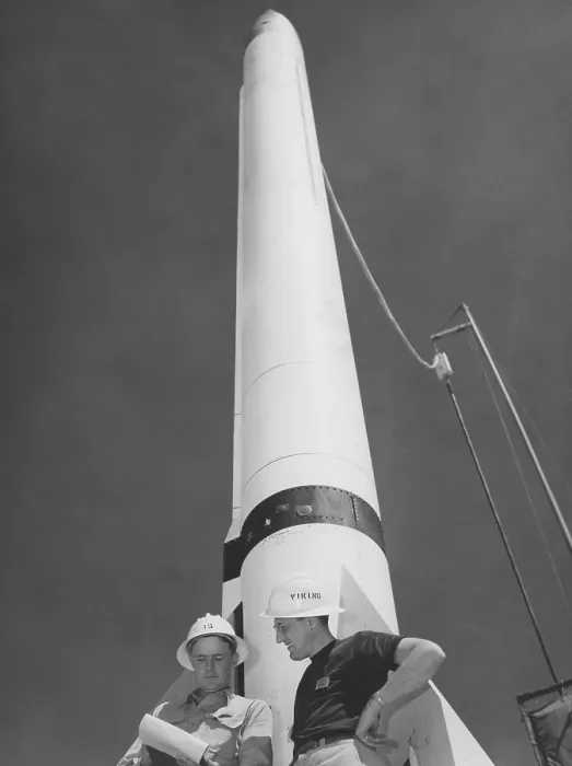 Framed Print : A Rocket. Two men in hard hats stand beside a rocket circa 1950 Framed Print : A Rocket. Two men in hard hats stand beside a rocket circa 1950