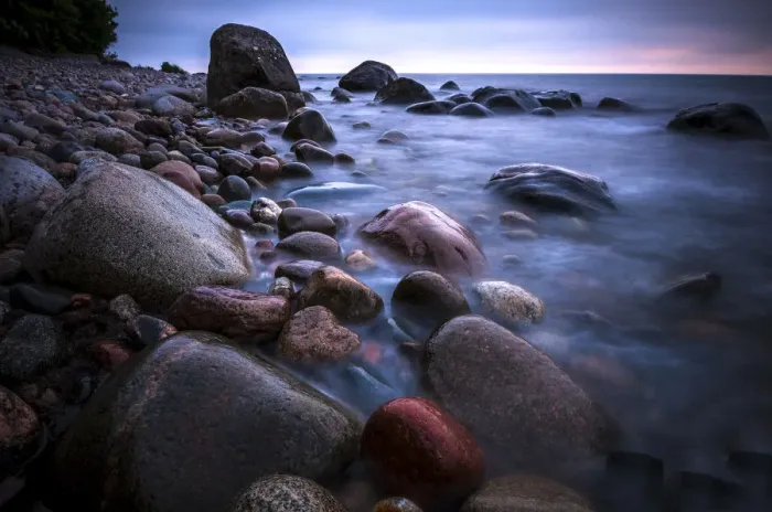 Framed Print : Rocks on a beach at sunset by the sea, bei Nardewitz, Rugen island, Rugen, Mecklenburg-Western Pomerania, Germany Framed Print : Rocks on a beach at sunset by the sea, bei Nardewitz, Rugen island, Rugen, Mecklenburg-Western Pomerania, Germany