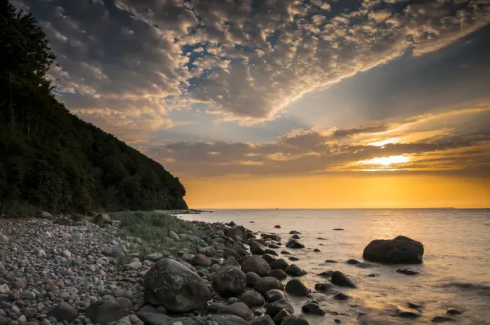 Framed Print : Rocks on a beach at sunset by the sea, bei Nardewitz, Rugen island, Rugen, Mecklenburg-Western Pomerania, Germany Framed Print : Rocks on a beach at sunset by the sea, bei Nardewitz, Rugen island, Rugen, Mecklenburg-Western Pomerania, Germany