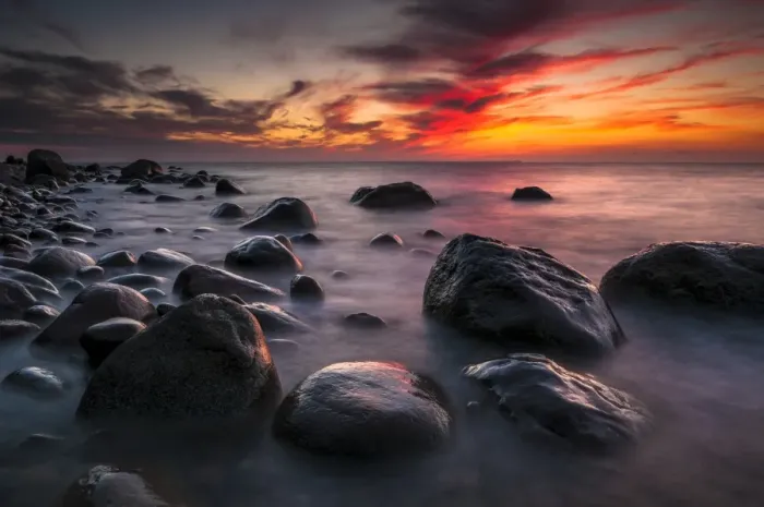 Framed Print : Rocks on a beach at sunset by the sea, bei Nardewitz, Rugen island, Rugen, Mecklenburg-Western Pomerania, Germany Framed Print : Rocks on a beach at sunset by the sea, bei Nardewitz, Rugen island, Rugen, Mecklenburg-Western Pomerania, Germany