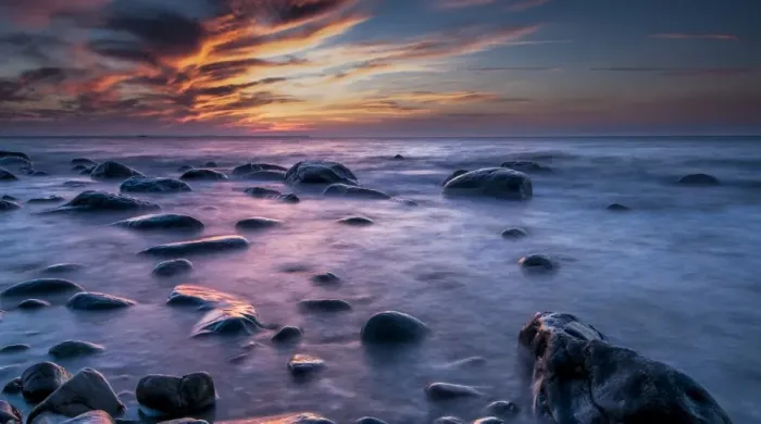 Framed Print : Rocks on a beach at sunset by the sea, bei Nardewitz, Rugen island, Rugen, Mecklenburg-Western Pomerania, Germany Framed Print : Rocks on a beach at sunset by the sea, bei Nardewitz, Rugen island, Rugen, Mecklenburg-Western Pomerania, Germany