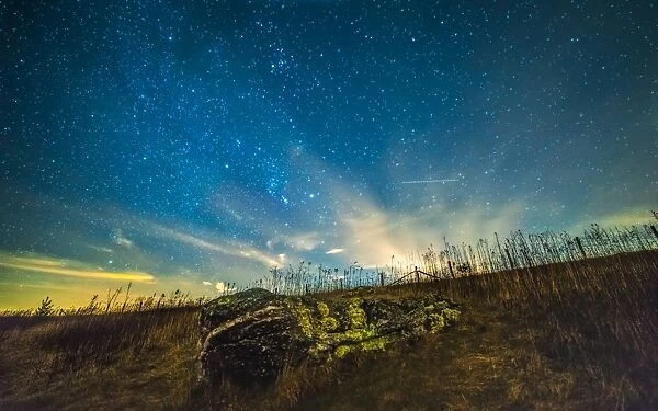 Rockstar. Stars above a rock out in a field at the Blue Ridge Parkway