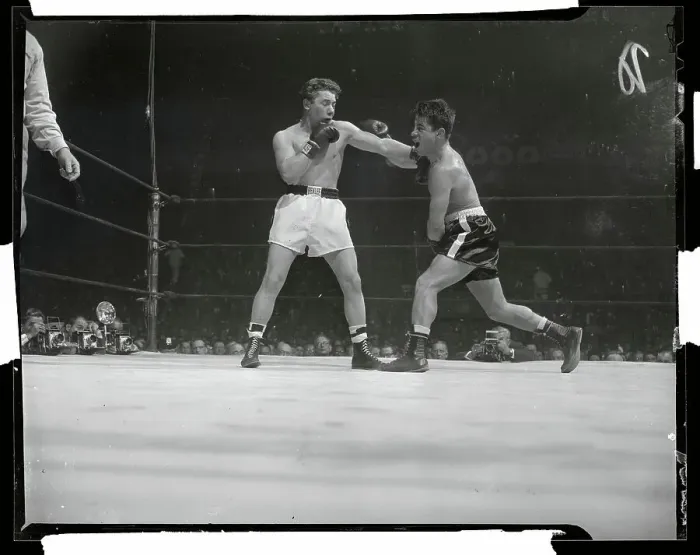 Framed Print : Rocky Graziano Boxing Against Tony Janiro Framed Print : Rocky Graziano Boxing Against Tony Janiro