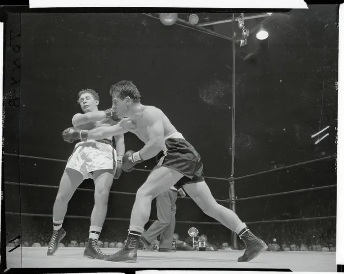 Framed Print : Rocky Graziano Puching Tony Janiro Framed Print : Rocky Graziano Puching Tony Janiro