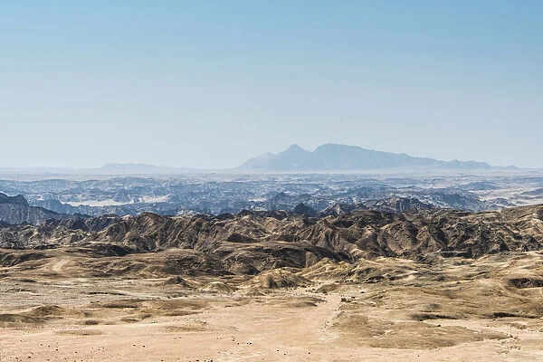 Rocky landscape furrowed by erosion, Moon Valley, Namib-Naukluft Park, Namib Desert, Namibia