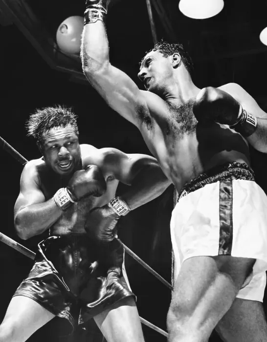 Framed Print : Rocky Marciano Missing with Wild Uppercut