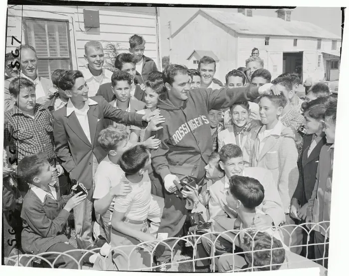 Framed Print : Rocky Marciano Patting a Young Fan's Head Framed Print : Rocky Marciano Patting a Young Fan's Head