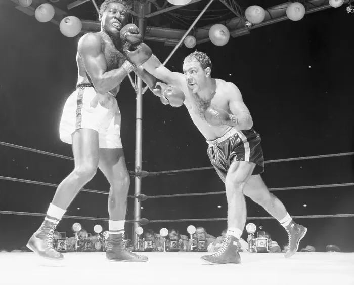 Framed Print : Rocky Marciano Punching Ezzard Charles Framed Print : Rocky Marciano Punching Ezzard Charles
