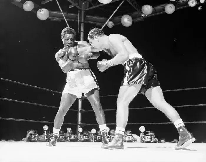Framed Print : Rocky Marciano Punching Ezzard Charles Framed Print : Rocky Marciano Punching Ezzard Charles