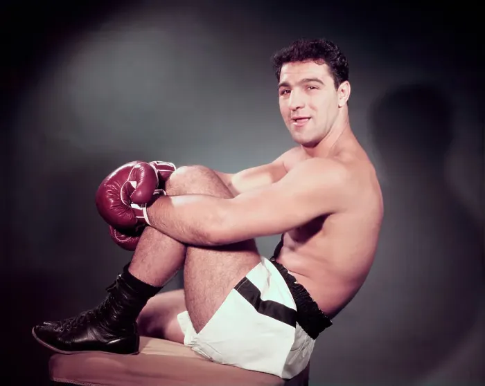 Framed Print : Rocky Marciano Sitting with One Knee Up