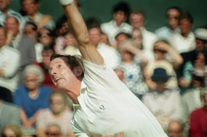 Framed Print : Rod Laver Displaying a Serve