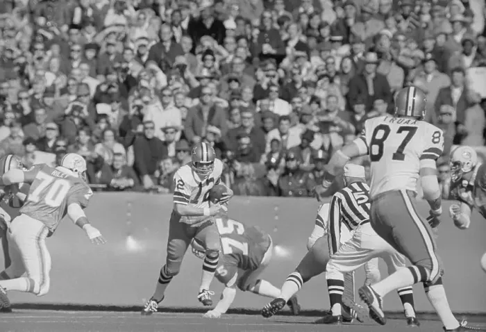 Framed Print : Roger Staubach Eluding Tackle