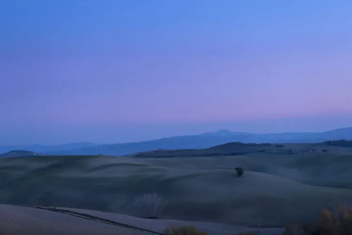 Framed Print : Rolling hill landscape of Val d Orcia after sunset Framed Print : Rolling hill landscape of Val d Orcia after sunset