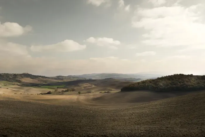 Framed Print : Rolling hills landscape of Val d Orcia after harvesting season Framed Print : Rolling hills landscape of Val d Orcia after harvesting season