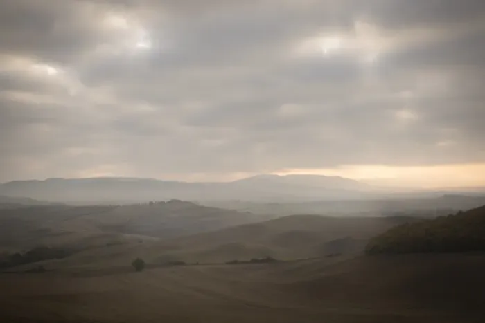Framed Print : Rolling hills landscape of Val d Orcia during morning haze Framed Print : Rolling hills landscape of Val d Orcia during morning haze