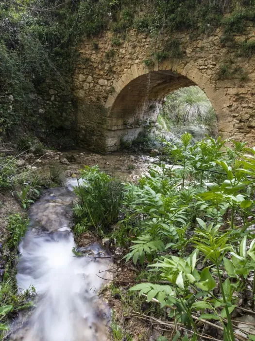 Framed Print : Roman bridge into a ravine in a mountain stream Framed Print : Roman bridge into a ravine in a mountain stream