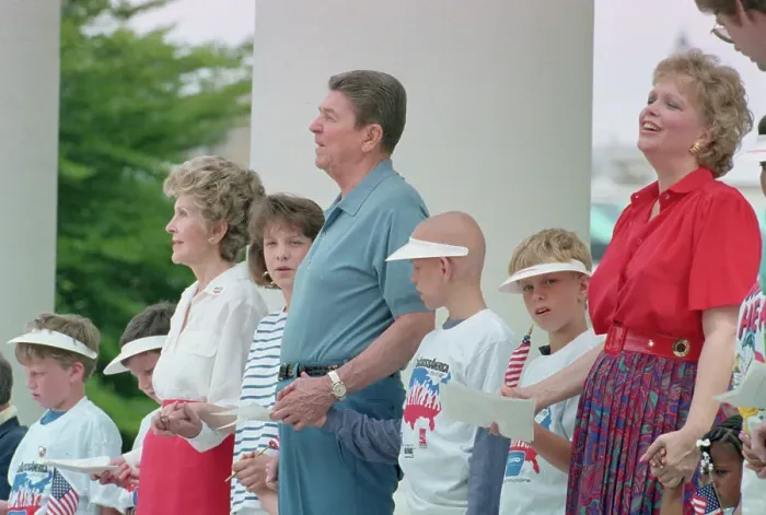 Framed Print : Ronald and Nancy Reagan Holding Hands of Children Framed Print : Ronald and Nancy Reagan Holding Hands of Children