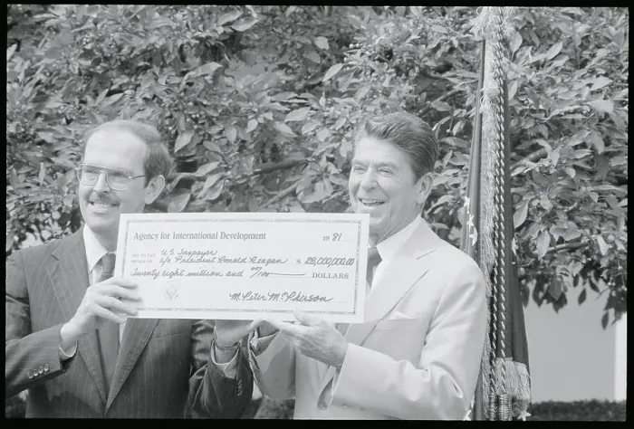 Framed Print : Ronald Reagan and Agency Director Holding Mock Check Framed Print : Ronald Reagan and Agency Director Holding Mock Check