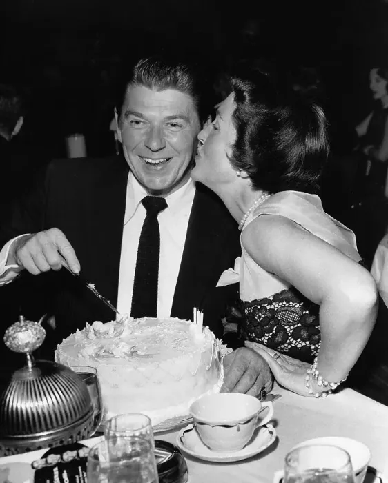 Framed Print : Ronald Reagan Cuts Birthday Cake Framed Print : Ronald Reagan Cuts Birthday Cake