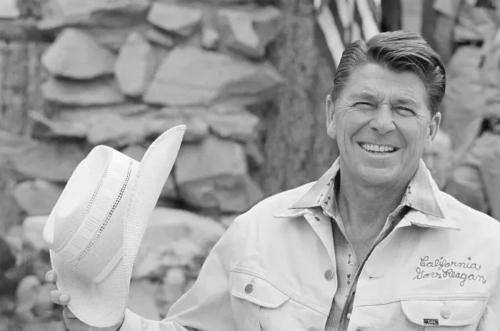 Framed Print : Ronald Reagan Holding a Cowboy Hat Framed Print : Ronald Reagan Holding a Cowboy Hat