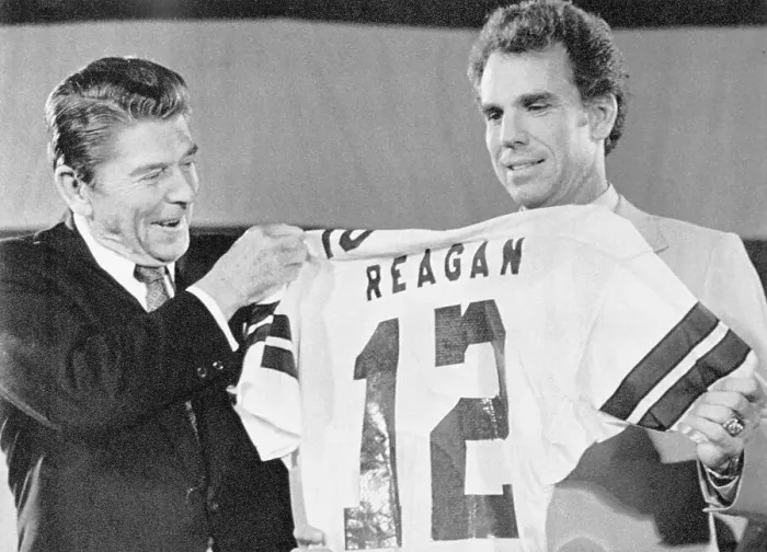 Framed Print : Ronald Reagan Holding Jersey Framed Print : Ronald Reagan Holding Jersey