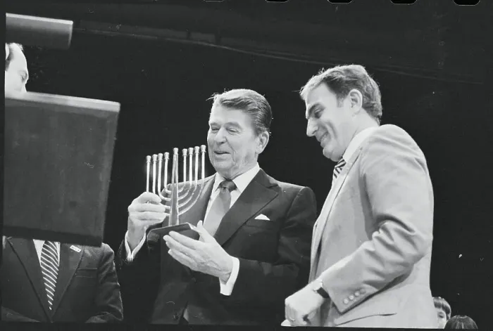 Framed Print : Ronald Reagan Holding a Menorah Framed Print : Ronald Reagan Holding a Menorah