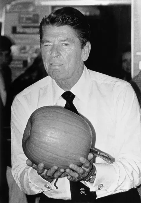 Framed Print : Ronald Reagan Holding a Pumpkin