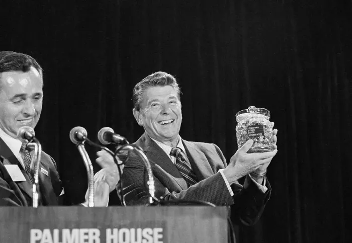 Framed Print : Ronald Reagan Holds Crystal Jar Of Candy Framed Print : Ronald Reagan Holds Crystal Jar Of Candy