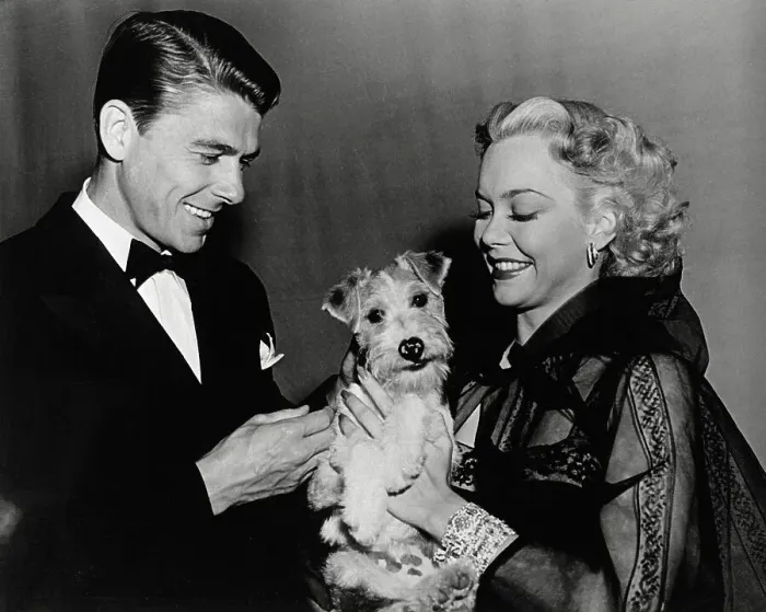Framed Print : Ronald Reagan and Jane Wyman Petting a Dog