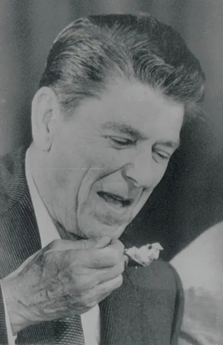 Framed Print : Ronald Reagan Looking at Food Framed Print : Ronald Reagan Looking at Food