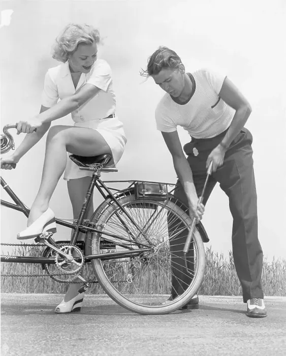 Framed Print : Ronald Reagan Pumping Bicycle Tire for Jane Wyman Framed Print : Ronald Reagan Pumping Bicycle Tire for Jane Wyman
