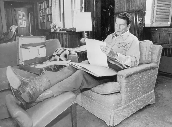 Framed Print : Ronald Reagan Reading While Lounging Framed Print : Ronald Reagan Reading While Lounging