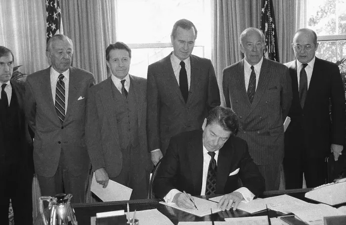 Framed Print : Ronald Reagan Signing Document
