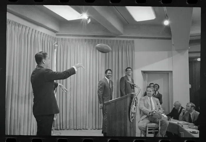 Framed Print : Ronald Reagan Throwing Football Framed Print : Ronald Reagan Throwing Football