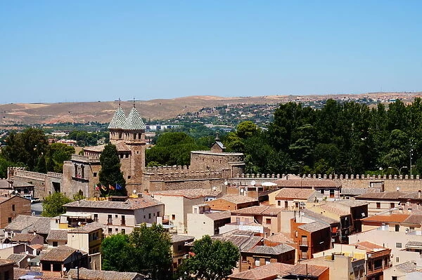 Rooftops and Puerta Nueva de Bisagra, Toledo, Spain