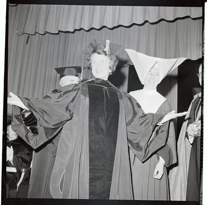 Framed Print : Rose Kennedy with Arms Outstretched in College Robe Framed Print : Rose Kennedy with Arms Outstretched in College Robe